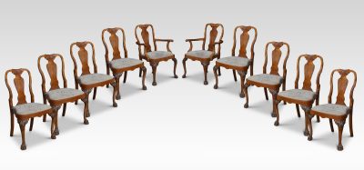 Set of ten walnut George II style dining chairs