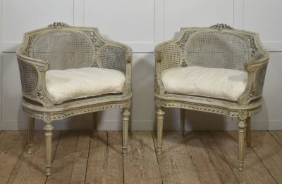 Elegant Pair of French Carved & Caned Tub Chairs In The Louis XVI Style